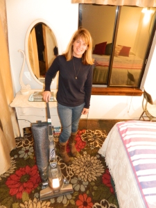 She approves... My wife poses with our new/used vacuum. She is smiling because I have already vacuumed the entire house